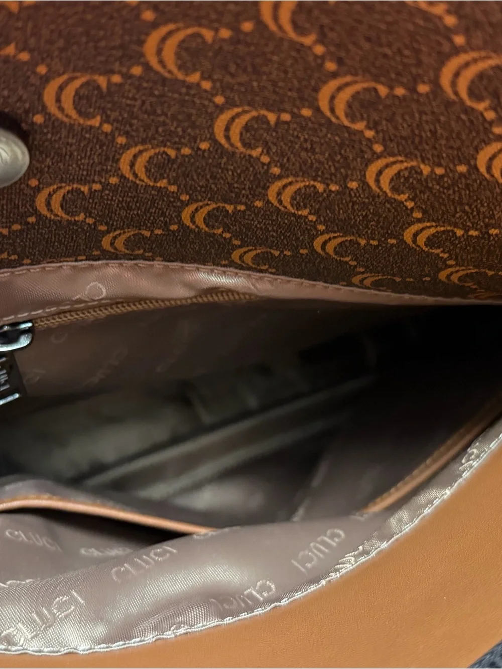 Cluci laptop Backpack with Crescent Pattern and different pockets.